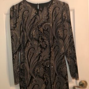 Gold and black velvet dress. Knee length, has a little bit if stretch to it.